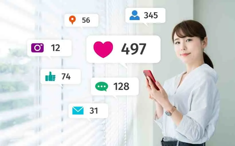 Woman holding a phone beside floating social media notification icons, with 497 loves the biggest count