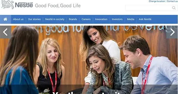 Screenshot of Nestlé's website homepage, with its "Good Food, Good Life" tagline, blue navigation bar and a banner of smiling staff