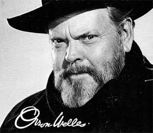Black-and-white portrait of a bearded man in a wide-brimmed hat, signed "Orson Welles", beside the "Nightmare" section